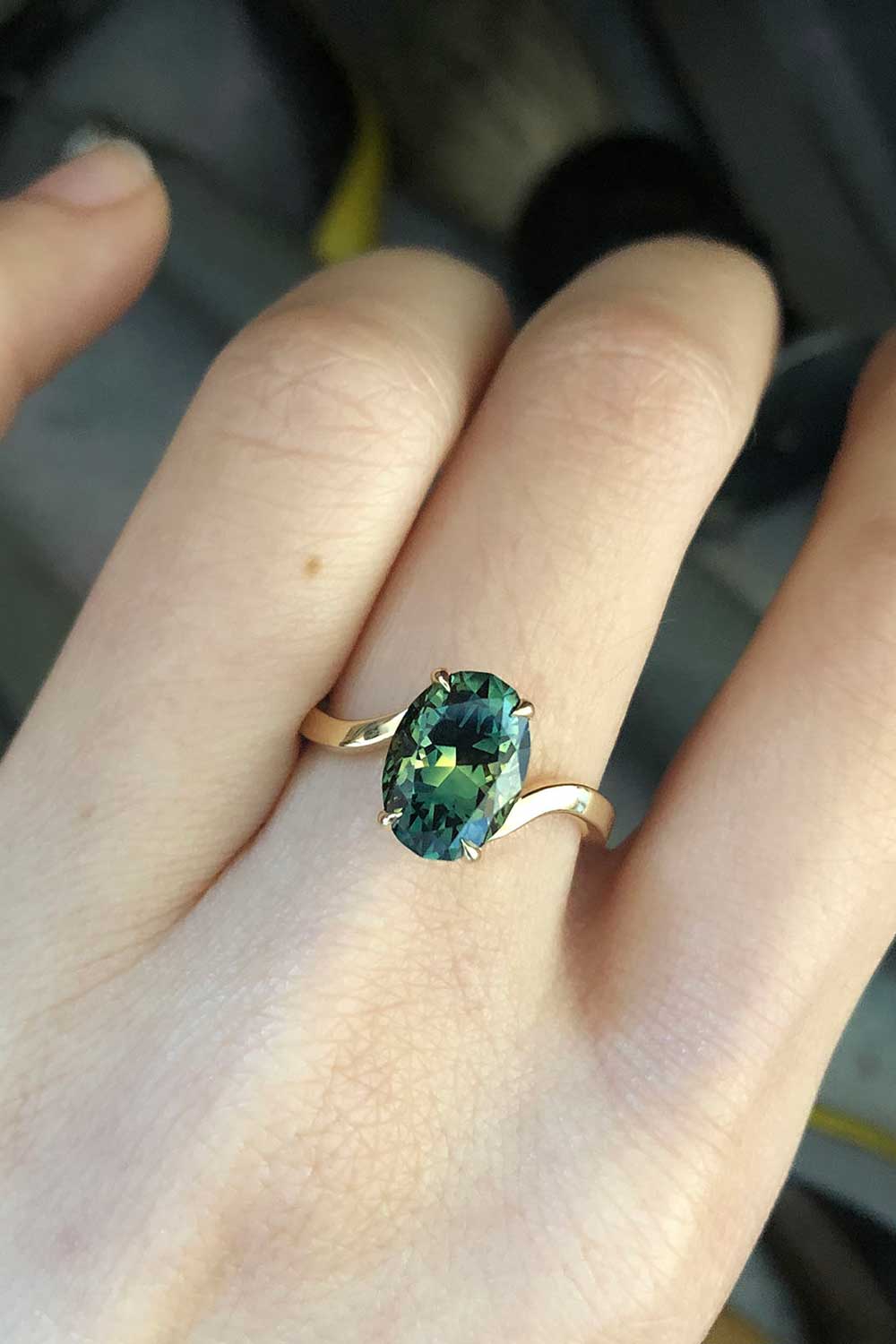 Green Australian sapphire custom made koru ring