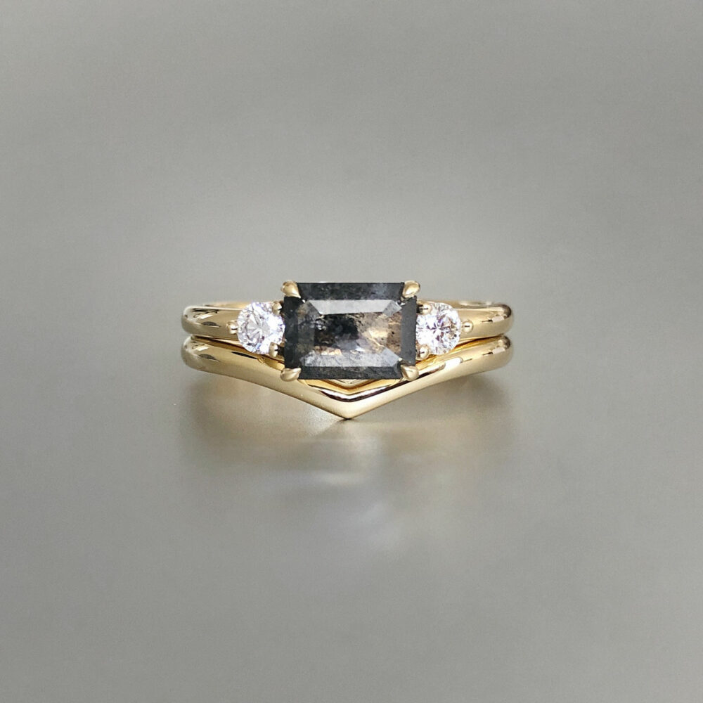 Salt and pepper diamond ring with white diamond side stones