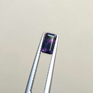Emerald cut Tanzanian sapphire for bespoke engagement ring design