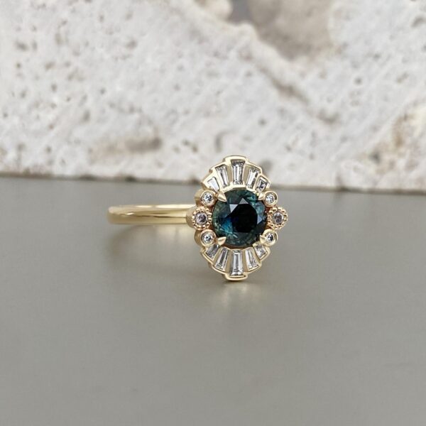 Statement gold sapphire and diamond modern engagement ring