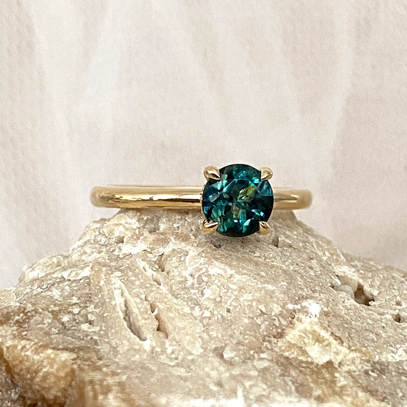 Round solitaire Australian teal sapphire ring