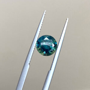 Round teal Australian opalescent sapphire